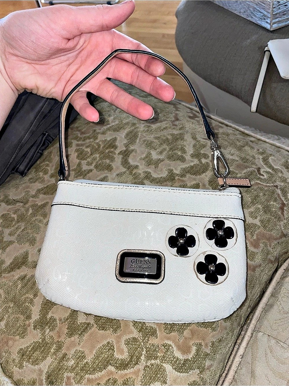 GUESS Floral wristlet in White & Black